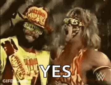 Two Wrestlers Are Standing Next To Each Other And One Of Them Is Wearing A Cowboy Hat . GIF