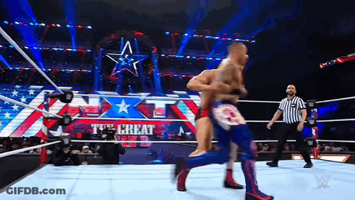 Two Wrestlers Fighting With Its Great Sign GIF