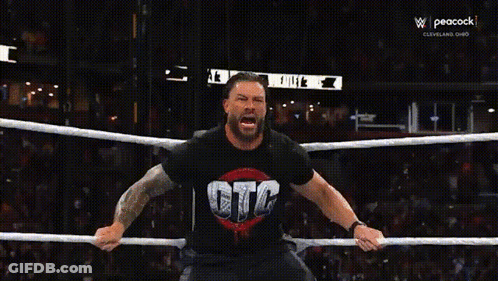Two Wrestlers In A Ring With The Word Prime On The Ring GIF