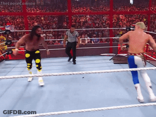 Two Wrestlers In A Wrestling Ring With The Looseconnon Written On The Bottom Right GIF