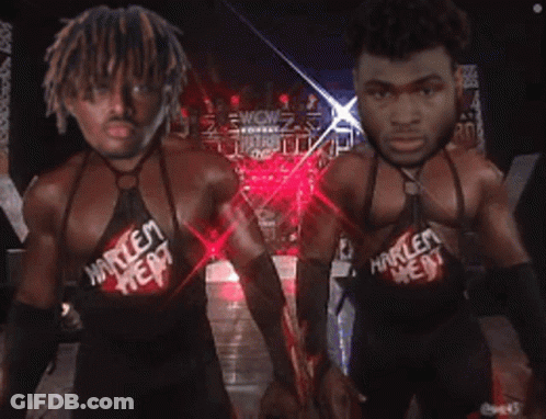 Two Wrestlers In Harlem Heat Shirts GIF