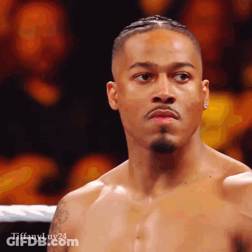 Two Wrestlers In Ring One Wearing Fox Shirt GIF