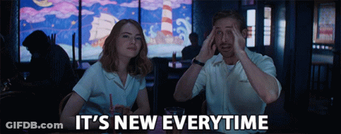 Two Wrestlers In Ring With American Nation Sign GIF