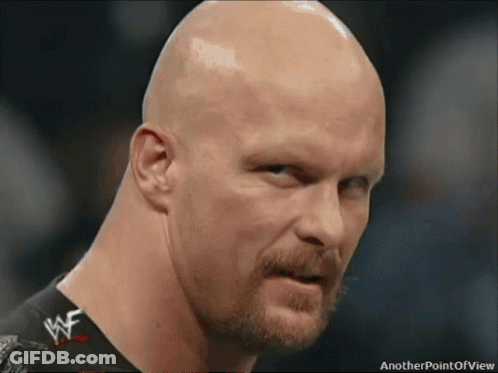 Two Wrestlers In Ring With Live Sign And Crowd GIF