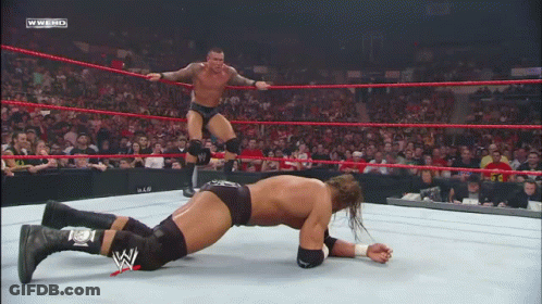 Two Wrestlers In Ring With WWEHD Text GIF