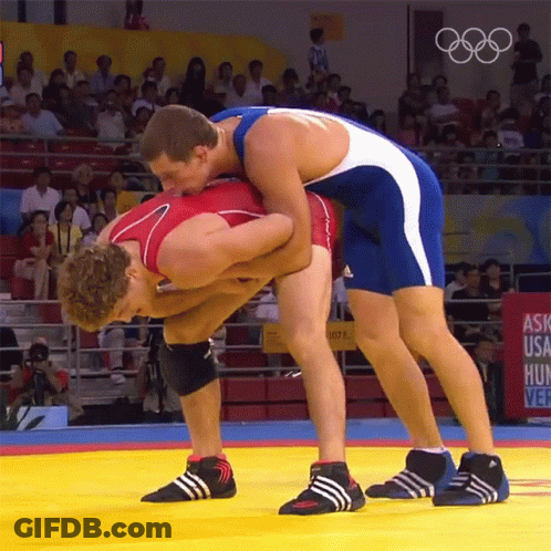 Two Wrestlers On Mat Saying Ask USA Hunt GIF