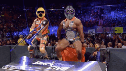 Two Wrestlers On Smackdown Live Stage GIF