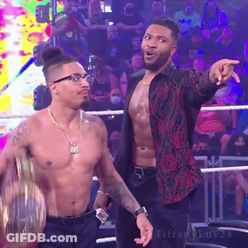 Two Wrestlers One In Carmelo Hayes T-Shirt GIF