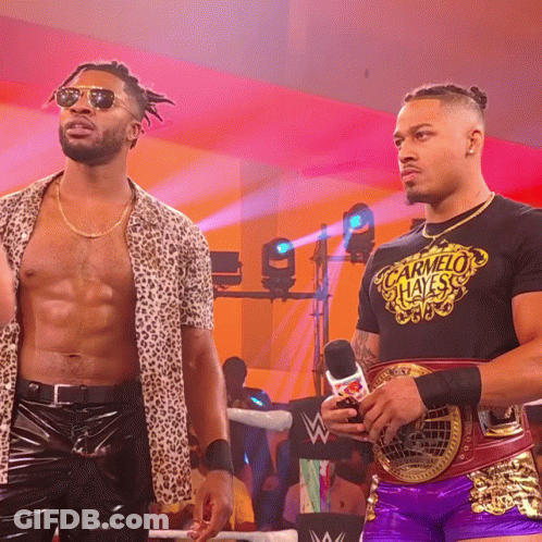 Two Wrestlers One In Carmelo Hayes T-Shirt GIF
