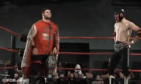 Two Wrestlers One Mask With Letter O GIF