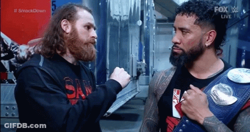 Two Wrestlers, One Wearing Wrestling Belt GIF