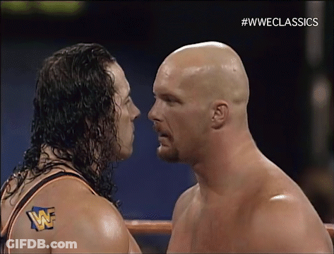 Two Wrestlers Standing In Ring GIF