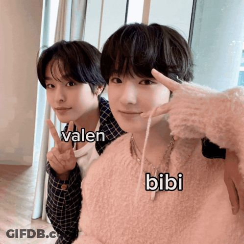 Two Young Boys Pose With Valen And Bibi GIF