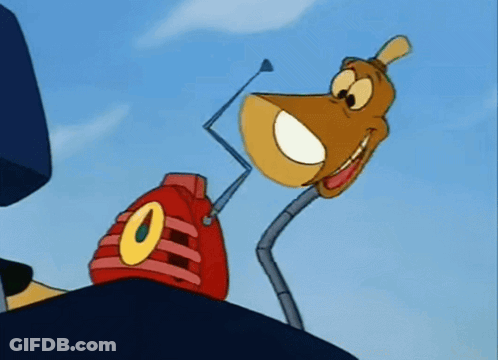 Two Young Boys Standing Side By Side GIF
