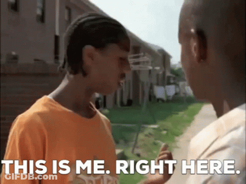 Two Young Men Are Standing Next To Each Other And One Of Them Is Saying This Is Me . Right Here . GIF