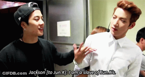 Two Young Men Are Standing Next To Each Other And One Of Them Says " Jackson " GIF