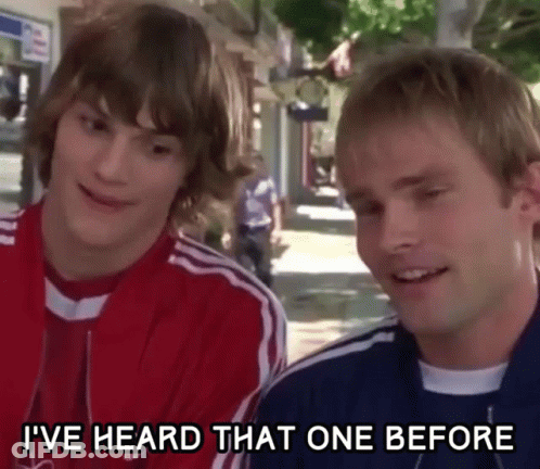 Two Young Men Are Standing Next To Each Other On A Sidewalk And One Of Them Is Saying I 'Ve Heard That One Before GIF