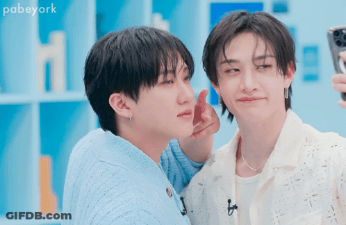 Two Young Men Are Taking A Selfie And The Words Pabeyork Are Visible In The Corner GIF
