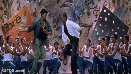 Two Young Men Dancing In Front Of Mirror GIF