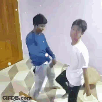 Two Young Men Dancing Together GIF