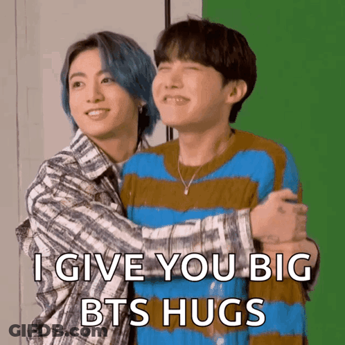 Two Young Men Hugging Each Other With The Words I Give You Big Bts Hugs Written On The Bottom GIF