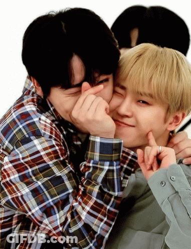 Two Young Men Hugging One Making Heart GIF