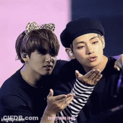 Two Young Men One Blowing Kiss GIF