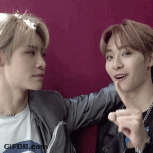 Two Young Men One Pointing At The Other GIF