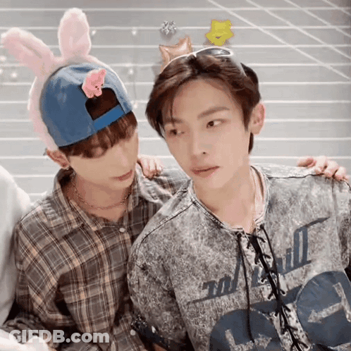 Two Young Men One Wearing Bunny Hat GIF
