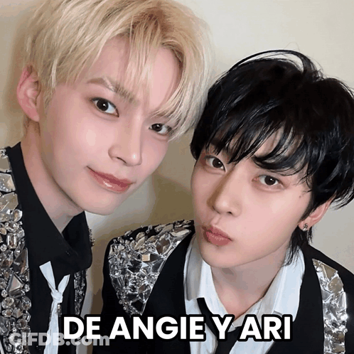 Two Young Men Posing De Angie Y Ari GIF