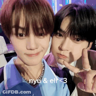 Two Young Men Posing Nyu And Elf < 3 GIF
