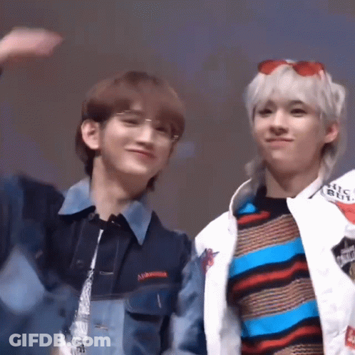 Two Young Men Smiling At Camera GIF