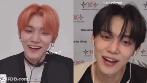 Two Young Men Smiling With Headphones GIF