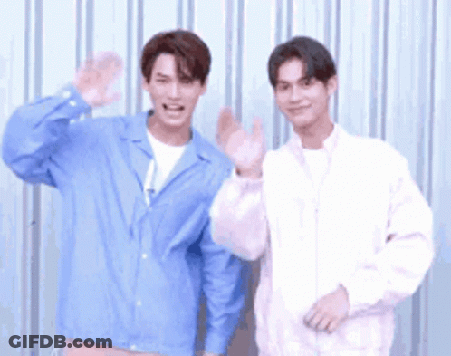 Two Young Men Waving Hands GIF