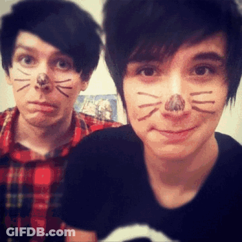Two Young Men With Cat Face Paint GIF