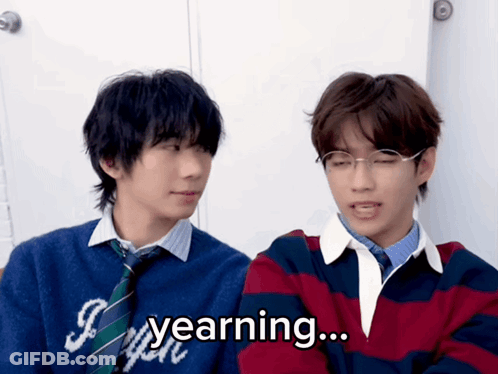 Two Young Men With Yearning GIF