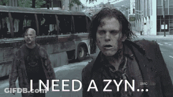 Two Zombies Walking Down A Street With The Words " I Need A Zyn " GIF