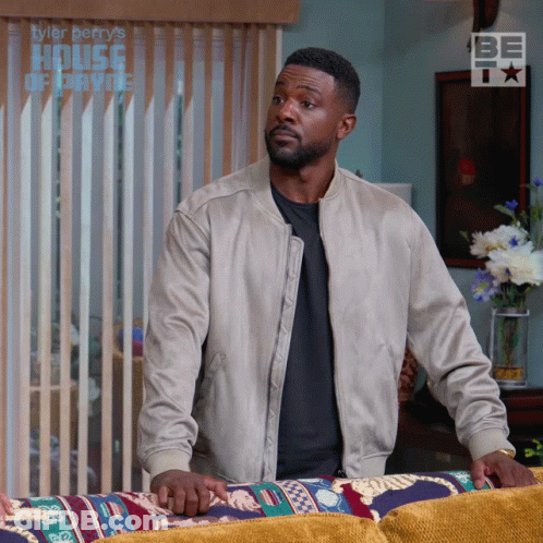 Tyler Perry's House Of Private Shows Man Standing In Front Of Couch GIF