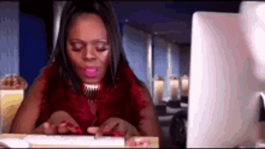 Typing Lady With Chewing Gum GIF