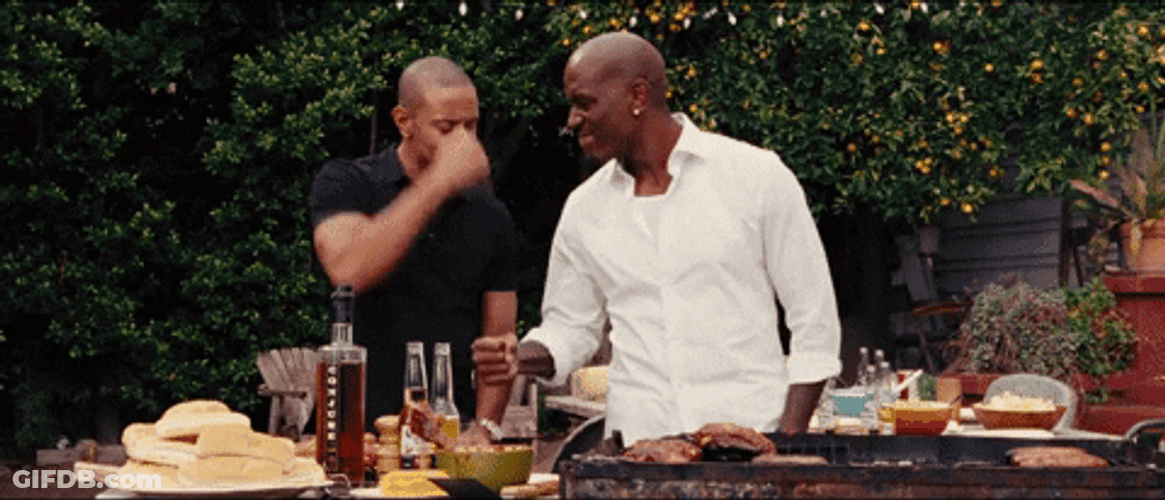 Tyrese Gibson And Ludacris Fist Bump While Cooking GIF