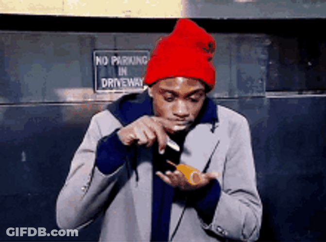 Tyrone Biggums Chappelle's Show Holding Corndog GIF