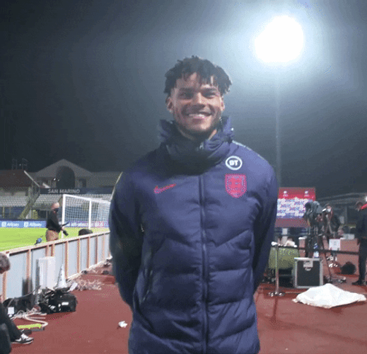 Tyrone Mings Footballer Smiling Walking Field GIF