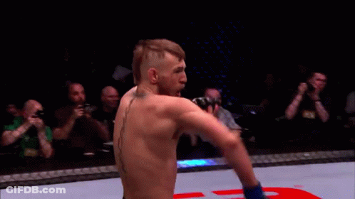 UFC Fighter Celebrating In Cage GIF