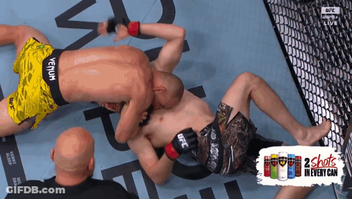 UFC Fighter Laying On Ground With 2 Shots Can GIF