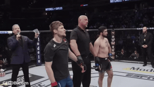 UFC Fighters In Boxing Ring With Referee GIF