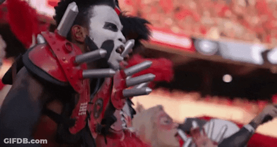 Uga Fan With Face Paint Cheering In Audience GIF
