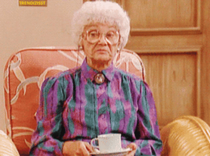Unbothered Grandmother Shrug GIF