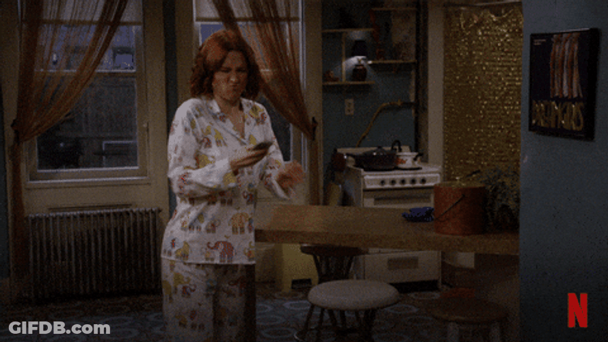 Unbreakable Kimmy Schmidt Throwing Phone GIF