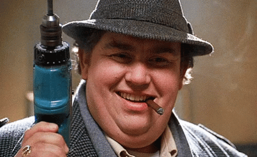 Uncle Buck Holding Screw Driver GIF