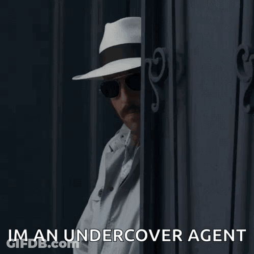 Undercover Agent Peeking Out GIF